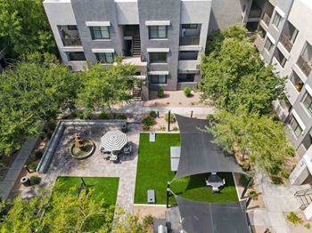 Spacious courtyard with outdoor games and hammocks